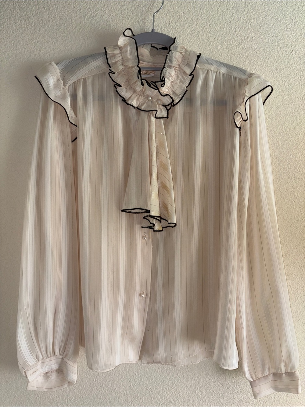 Ruffled Tie-Neck Blouse in Cream with Black Trim
